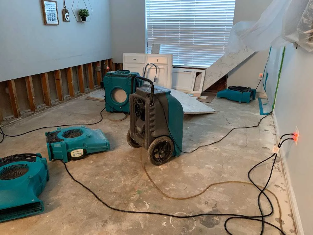 Dehumidifier in flood-cut room for Water Damage Restoration in Ludington